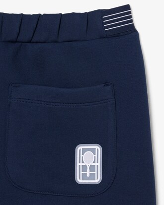 Short Tennis H&eacute;ritage Ultra Dry badge