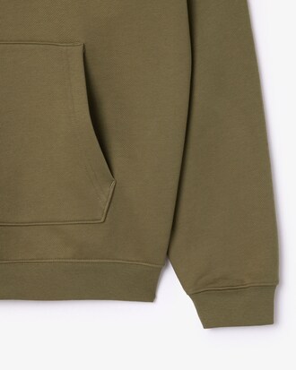 Sweatshirt à capuche loose fit avec badge