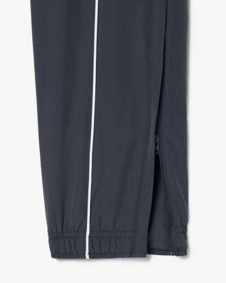 Pantalon de surv&ecirc;tement Sport d&eacute;perlant liser&eacute;s