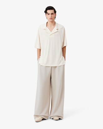 Pantalon de surv&ecirc;tement satin&eacute; D&eacute;fil&eacute;