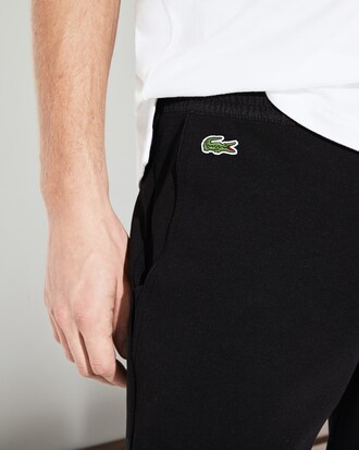 Jogging Lacoste SPORT en molleton et ceinture contrast&eacute;e