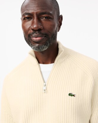 Pull zippé en laine cardée col montant