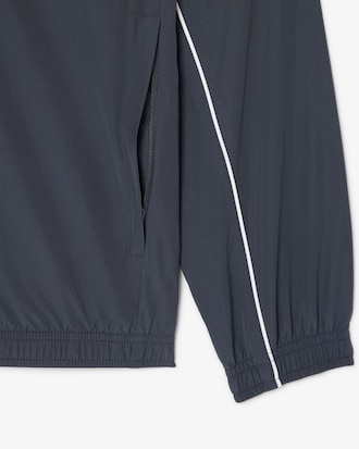 Veste de surv&ecirc;tement Sport d&eacute;perlante liser&eacute;s