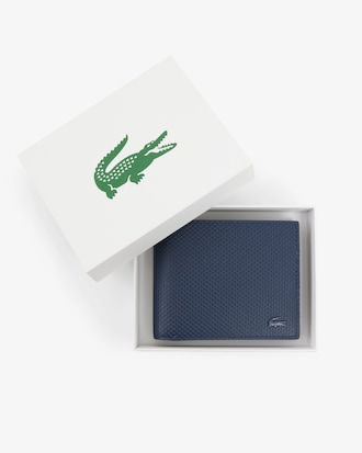 Portefeuille zipp&eacute; Chantaco en cuir piqu&eacute;