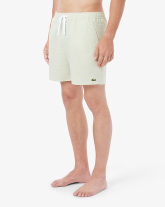 Short de bain mi-long ray&eacute; textur&eacute;