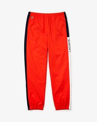 Pantalon de surv&ecirc;tement Tennis Lacoste SPORT avec bande color-block