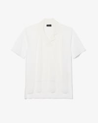 Polo loose fit maille transparente D&eacute;fil&eacute;