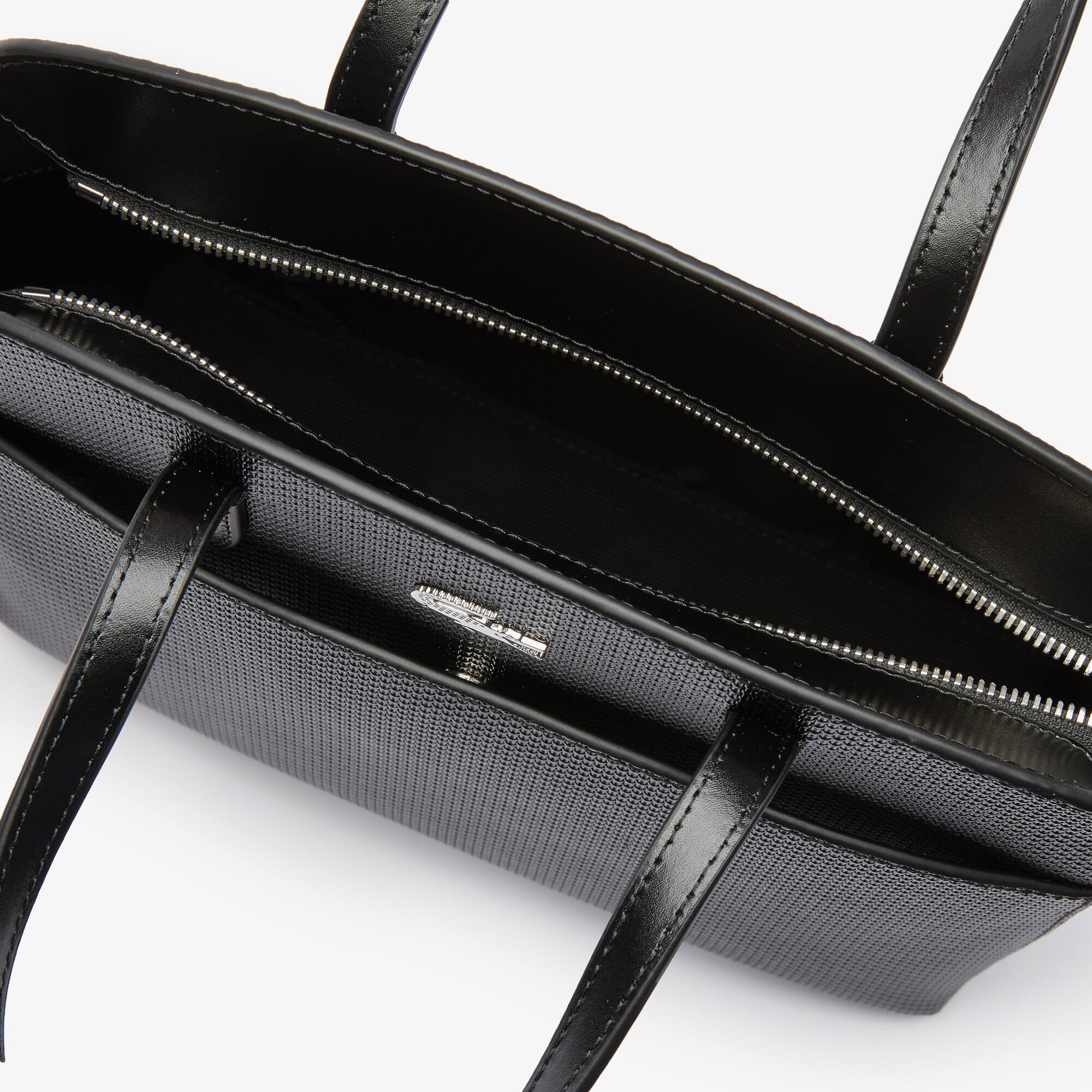 sac lacoste cuir piqué