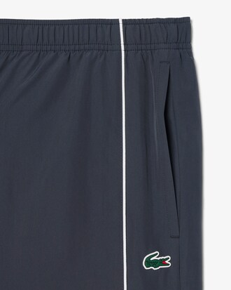 Pantalon de surv&ecirc;tement Sport d&eacute;perlant liser&eacute;s