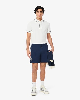 Short Tennis Héritage Ultra Dry badge
