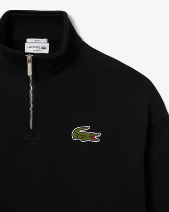 Sweatshirt col zippé loose fit avec badge