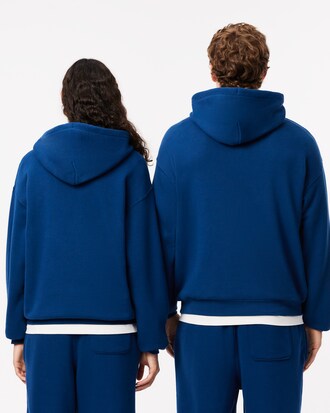 Sweatshirt à capuche loose fit avec badge