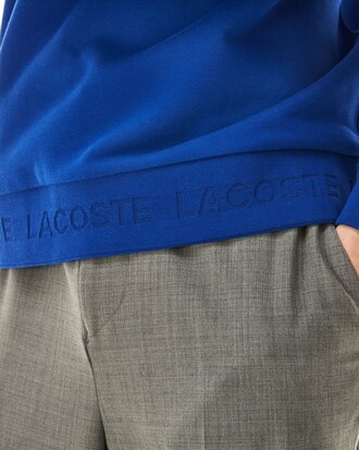 Sweatshirt col rond en molleton uni avec signature ton sur ton