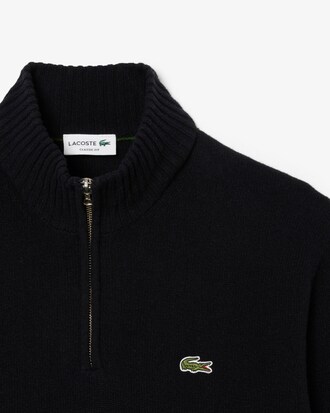 Pull zippé en laine cardée uni col montant