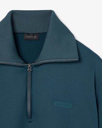 Sweatshirt col montant zipp&eacute; satin&eacute; D&eacute;fil&eacute;