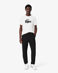 Pantalon de surv&ecirc;tement Tennis griff&eacute;