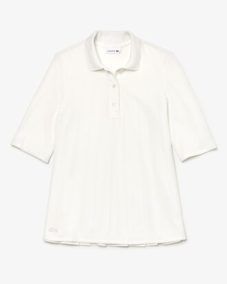 Polo Lacoste en petit piqu&eacute; uni avec dos pliss&eacute;