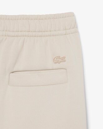 Pantalon de surv&ecirc;tement satin&eacute; D&eacute;fil&eacute;