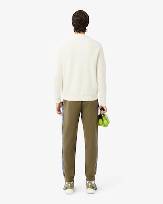 Pantalon de surv&ecirc;tement Tennis bandes griff&eacute;es