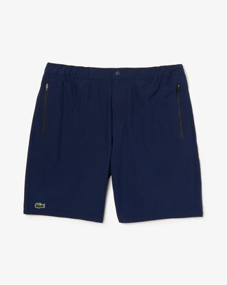 Short de bain stretch uni avec poches et logo vagues