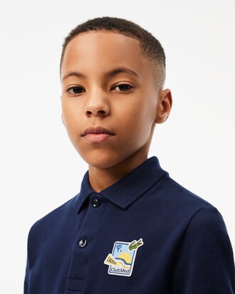 Polo Lacoste x Club Med en petit piqué avec badge