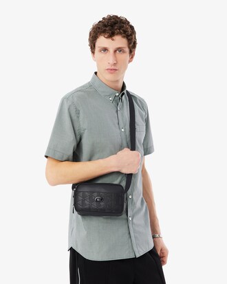 Sacoche verticale monogramme en cuir