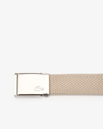 Cintura da uomo in tessuto intrecciato con fibbia a placca e incisione di coccodrillo