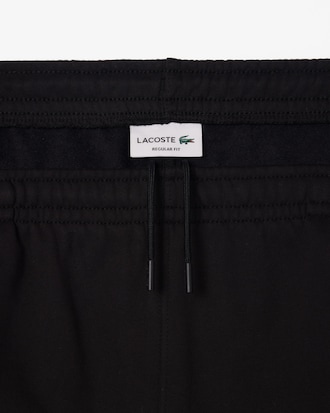 Shorts in pile con striscia con logo regular fit