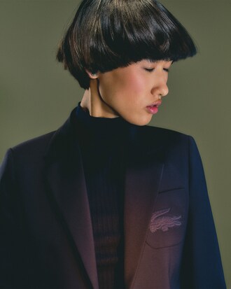 Blazer in lana slim fit con logo ricamato