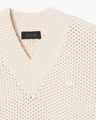 Gilet in piqu&eacute; traforato a righe