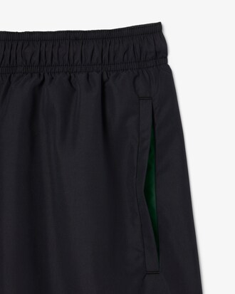 Pantaloncini da bagno monocromatici di lunghezza media