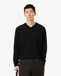 Maglione con scollo a V monocromatico in lana merino