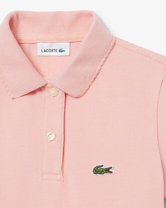 Polo in piqu&eacute; con collo smerlato