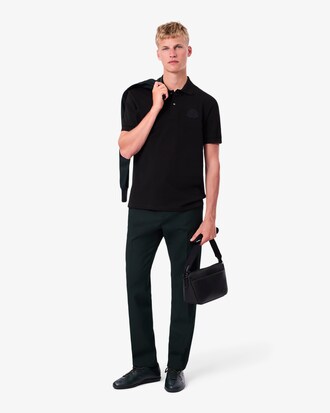 Polo classic fit in piqu&eacute; con stemma ricamato