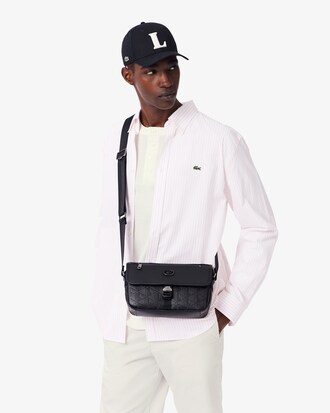 Borsa piccola in pelle con patta con monogramma