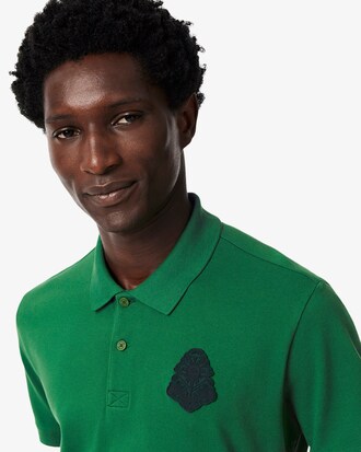 Polo da golf in mini piqu&eacute; elasticizzato con stemma