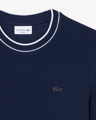 T-shirt in piqu&eacute; elasticizzato con colletto a righe
