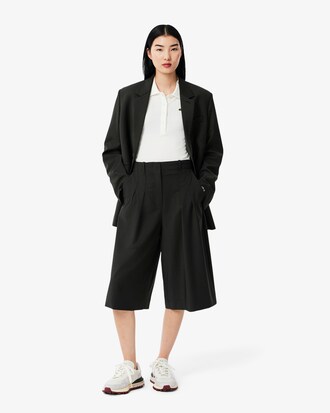 Bermuda oversize lunghi taglio ampio con pieghe