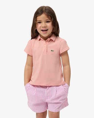 Polo in piqu&eacute; con collo smerlato