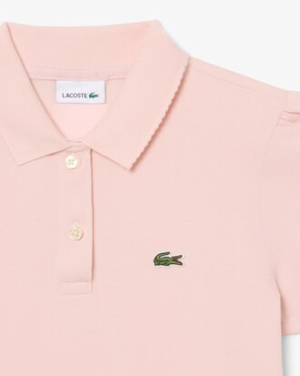 Polo in mini piqu&eacute; con colletto smerlato
