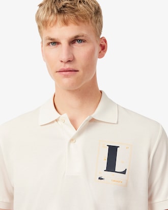 Polo classic fit in piqu&eacute; con stampa