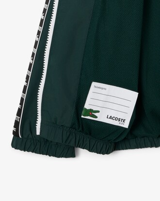 Piumino sportivo con cappuccio con logo e righe