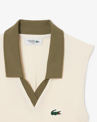 Polo da tennis smanicata in maglia elasticizzata