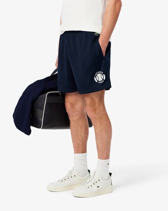 Shorts in mesh grafico
