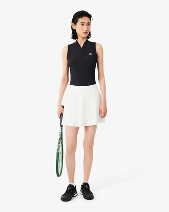 Polo da tennis senza maniche elasticizzata in due tessuti