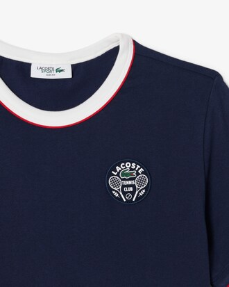T-shirt da tennis Ultra Dry con badge Heritage