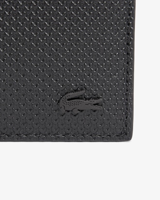 Portafoglio in pelle effetto piqu&eacute; con zip Chantaco