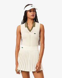 Polo da tennis smanicata in maglia elasticizzata