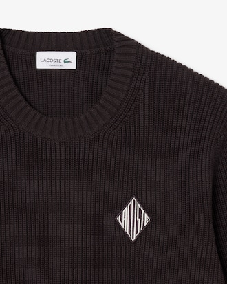 Maglione con coste perlate e stemma