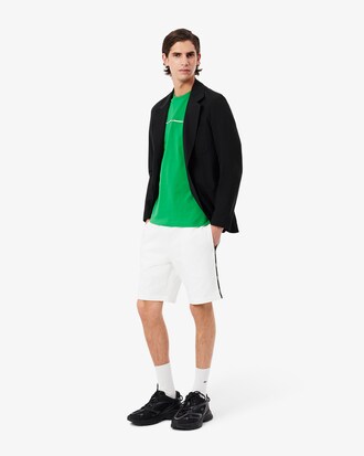 Shorts in cotone felpato con profili con logo